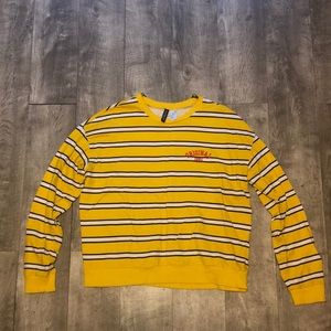 Long sleeve yellow shirt size M.